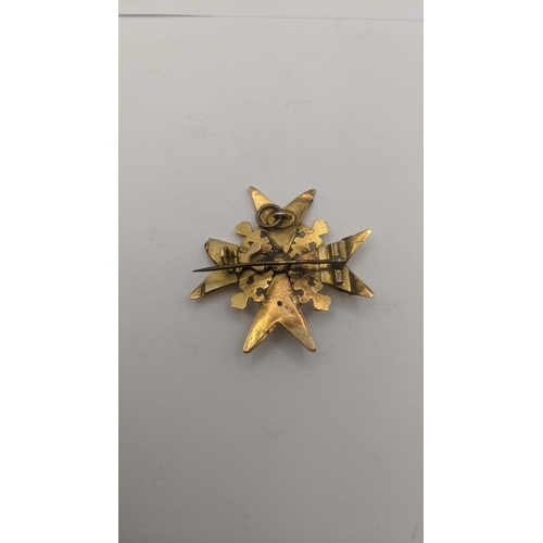 148 - A 19th century yellow gold brooch star style with fleur-de-lis design, tested as 15ct yellow gold, A... 