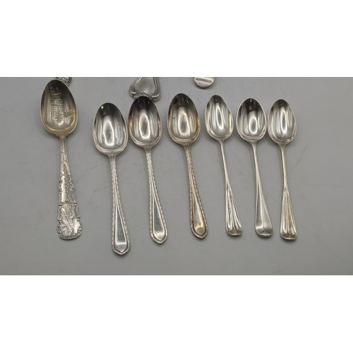 15 - Silver comprising of a sugar shifter a group of silver tea mixed tea spoons, along with two 800 silv... 