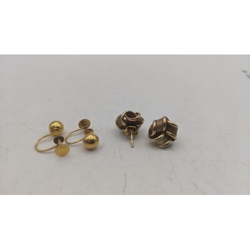 18 - Two pairs of 9ct yellow gold lady's earrings to include a pair of tricoloured knot style stud earrin... 