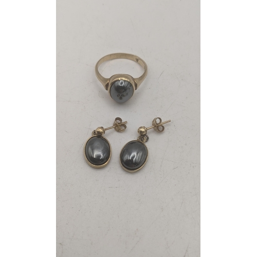 19 - 9ct yellow gold and Hematite three piece suite to include a ring and a pair of stud earrings total w... 