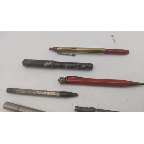 22 - Pens and propelling pencils to include a 1940s  Parker Vacumatic golden pearl fountain pen with Park... 