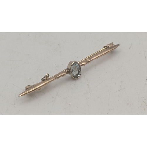 33 - An early 20th century 9ct gold aquamarine set bar brooch together with a gold plated pendant inset w... 