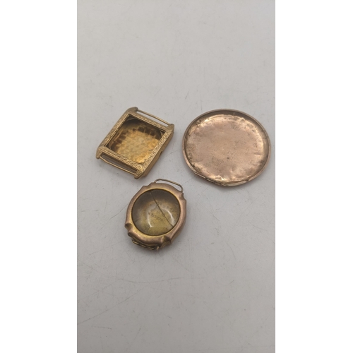 4 - 9ct yellow gold to include two wristwatch cases A/F and the back of a watch case, total weight 7.8g
... 