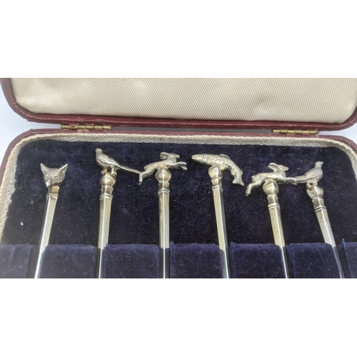 40 - A set of six silver hunting teaspoons with animals to the handles, total weight 82.4g
Location:A4BT
... 