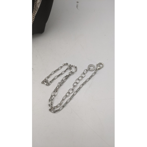 61 - A selection of various silver necklaces to include a thick gauge snake link example, flat curb link ... 