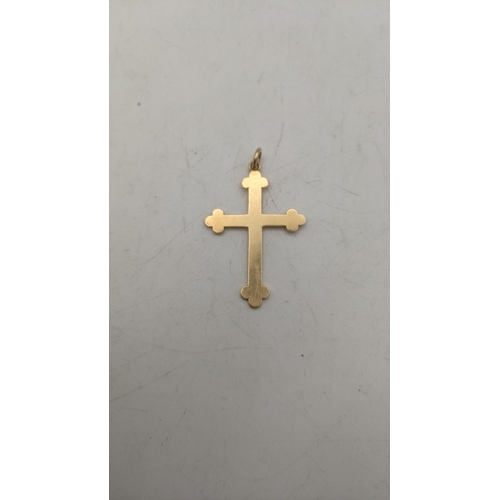 68 - A yellow metal pendant fashioned as a crucifix tested as 14ct yellow gold 3.7g
Location:CAB9
If ther... 