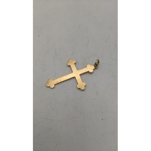 68 - A yellow metal pendant fashioned as a crucifix tested as 14ct yellow gold 3.7g
Location:CAB9
If ther... 