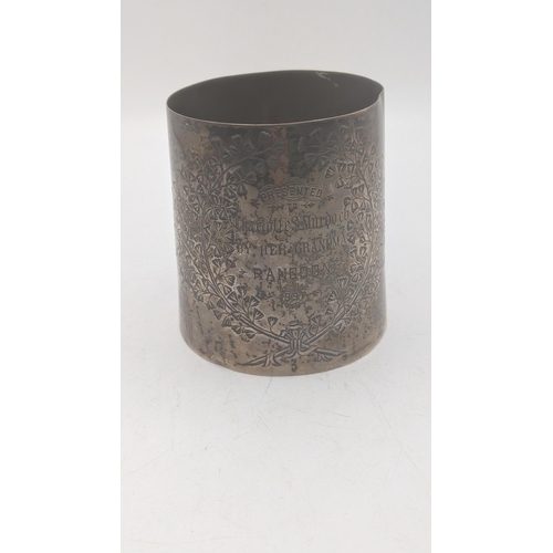 7 - A silver cup presented to Charlotte S Mardock decorated with a floral engraved design 132.7g
Locatio... 