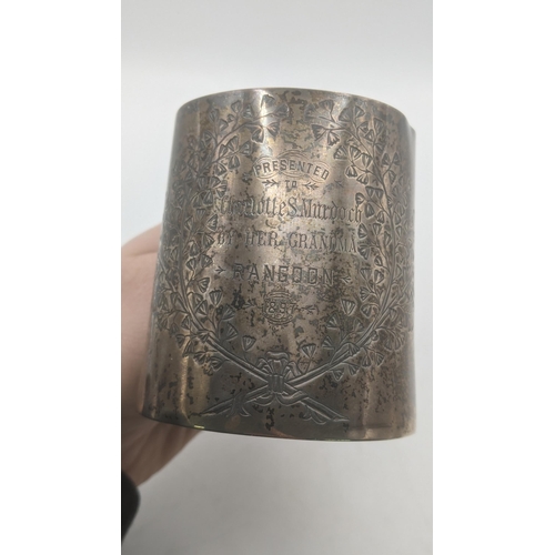 7 - A silver cup presented to Charlotte S Mardock decorated with a floral engraved design 132.7g
Locatio... 