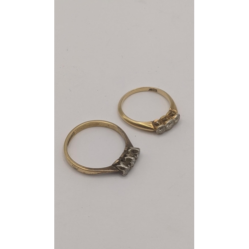 84 - Two three stone ladies diamond rings to include one in a platinum claw setting on an 18ct yellow gol... 