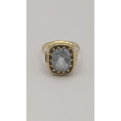 96 - A 14ct yellow gold and blue topaz ring, old cushion cut blue topaz in a 14-claw setting, size R 1/2,... 