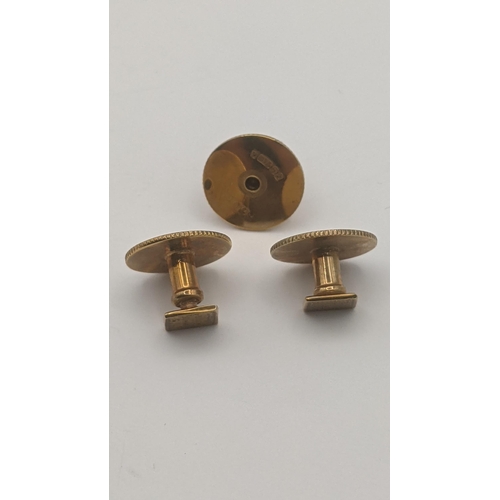 97 - Three 9ct yellow gold studs with engine turned design, total weight 4.2g Location:CAB2
If there is n... 