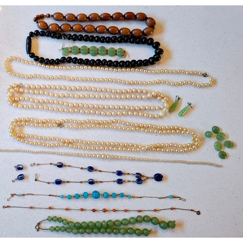 78 - Mixed vintage bead jewellery to include extra long simulated pearl necklaces, a pair of jade drop ea... 