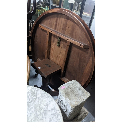 233 - A Victorian mahogany tilt top table on three cabriole legs
Location G
If there is no condition repor... 