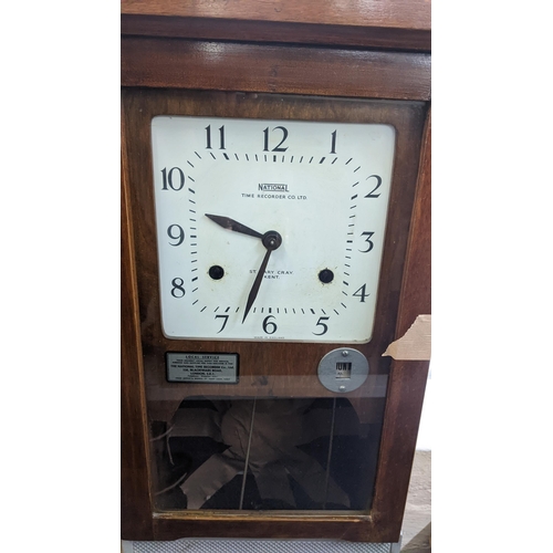 236 - An early/mid 20th century National Time Recorder clocking in clock, 98.5cm h x 36cm w
Location: LWF
... 