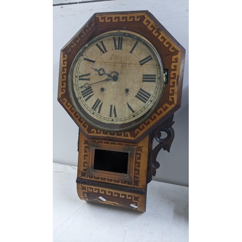 249 - Two 19th century drop dial clocks to include an American burr walnut 8-day clock, circa 1880
Locatio... 