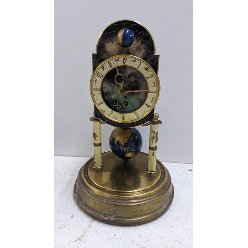 254 - A mid 20th century Kaiser German Astro Torsian Zodiac anniversary clock, 32cm h
Location: A1M
If the... 