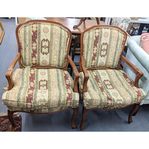 260 - A pair of French style beech framed armchairs, on cabriole legs
Location: A2F
If there is no conditi... 