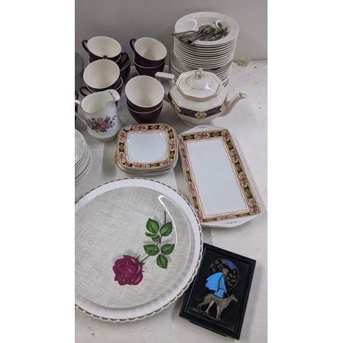 266 - A mixed lot to include a J&L Meakin part tea service, silver plated basket, cutler and other items
L... 