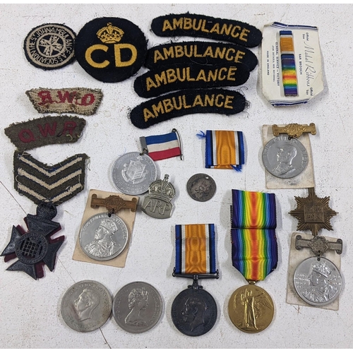 270 - A collection of medals and badges to include a WWI group named to 553265 PTE J Dickie 16 La an dR
Lo... 