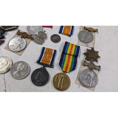 270 - A collection of medals and badges to include a WWI group named to 553265 PTE J Dickie 16 La an dR
Lo... 