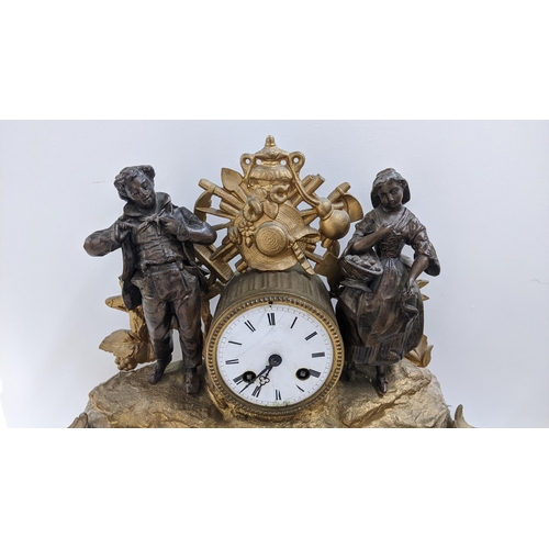 278 - A late 19th century French gilt metal mantel clock, the drum head cock flanked by two figures, the 8... 