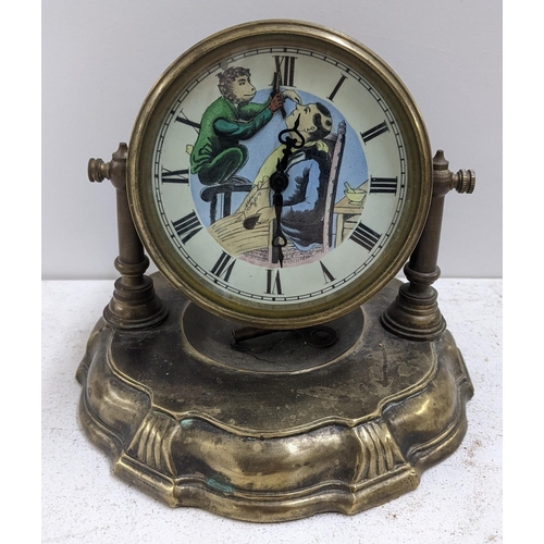 283 - An early/mid 20th century brass drum cased mantel clock with automaton monkey barber dial, 16cm h x ... 