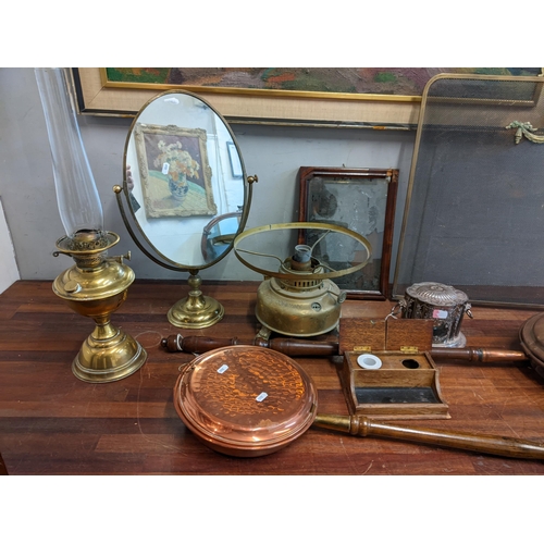 357 - Collectables to include a brass fire screen, a brass oil lamp, two bed warming pans, a silver plated... 