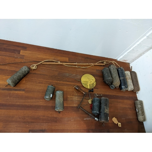 359 - clock parts to include lead and other longcase clock weights, pendulum parts and keys
Location: G
If... 