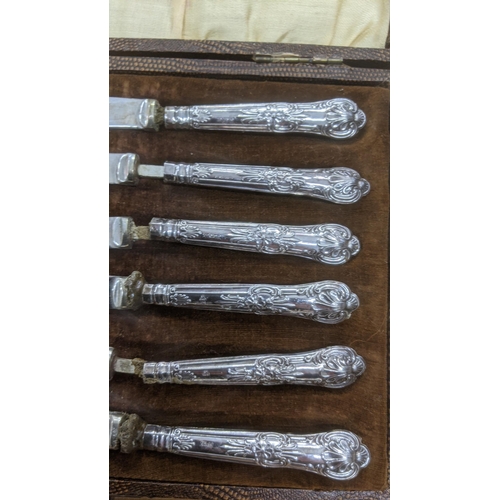 101 - Two set of silver handled butter knives in fitted cases one set hallmarked 1919 the other set A/F
 L... 