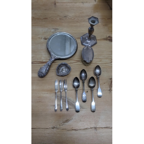 126 - Mixed silver items to include four fiddle pattern teapots, a floral embossed pin dish, a candlestick... 