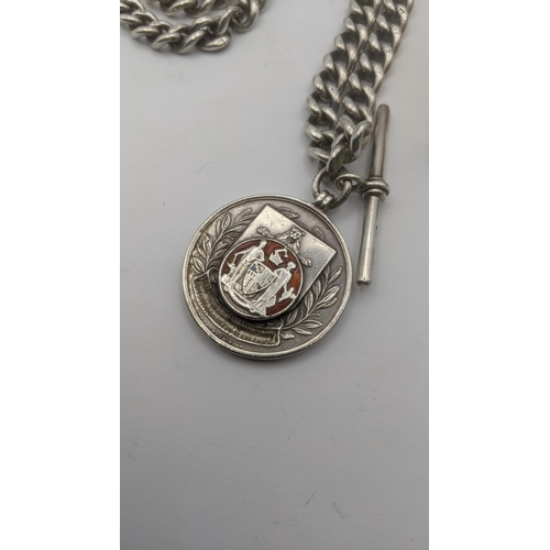 95 - A silver pocket watch chain with bulldog clip A/F T bar and silver and enamel fob 76.8g, together wi... 