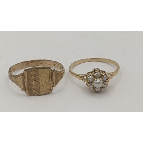 130 - Two 9ct yellow gold rings to include a seed pearl flower head example along with a gents signet ring... 