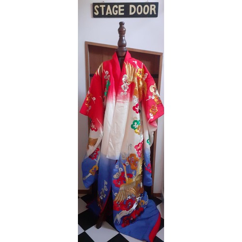 80 - A Japanese heavily embroidered Uchikake/wedding kimono robe in colourful blues, reds, green and gold... 