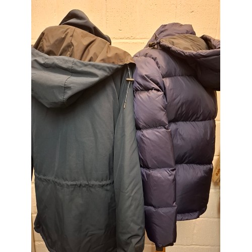 89 - Two ladies Penfield navy jackets, one padded with detachable hood, size Medium (approx 38