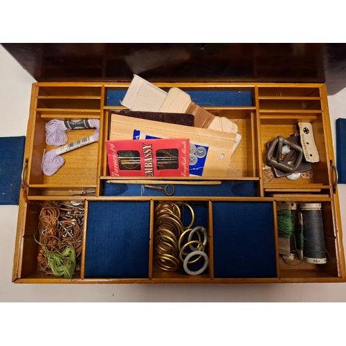 87 - A Victorian English burr walnut fitted sewing box to include 2nd Sylko branded cotton reels with 'si... 