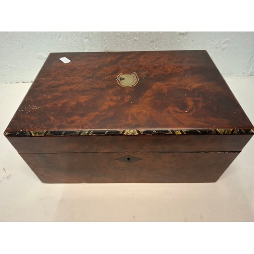 87 - A Victorian English burr walnut fitted sewing box to include 2nd Sylko branded cotton reels with 'si... 