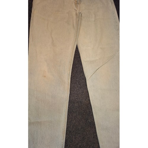 84 - Two pairs of Vintage stone washed Levi jeans comprising a pair of 551 Silver Medal wide leg jeans ap... 