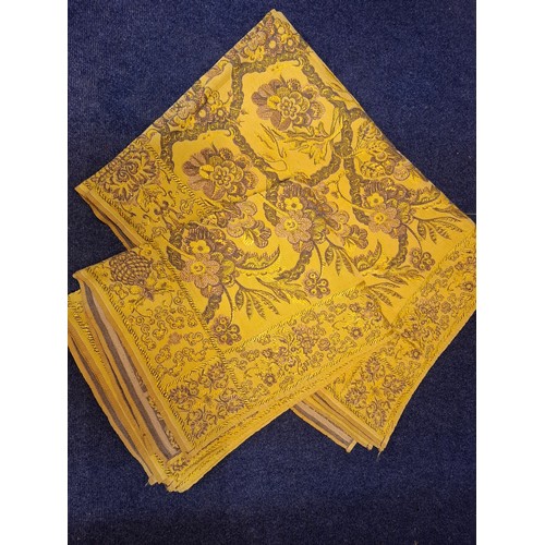 82 - A pre 1949 pair of Chinese single bed covers in mustard yellow with machine printed pattern and a ha... 