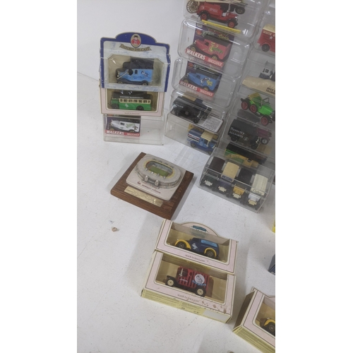 355 - A collection of model cars to include Matchbox, Days Gone and others to include a boxed Only Fools a... 