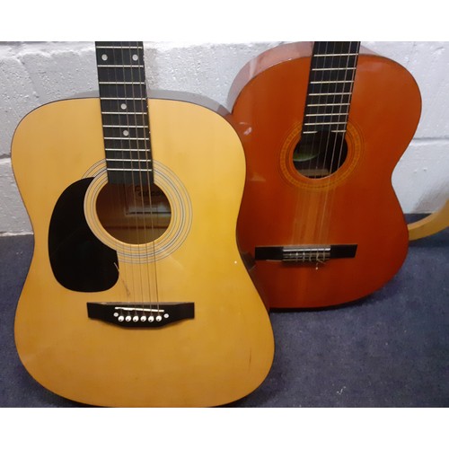 473 - Two 6-string acoustic guitars comprising a Falcon model no:FG100N and a Spanish BM Concert guitar. L... 