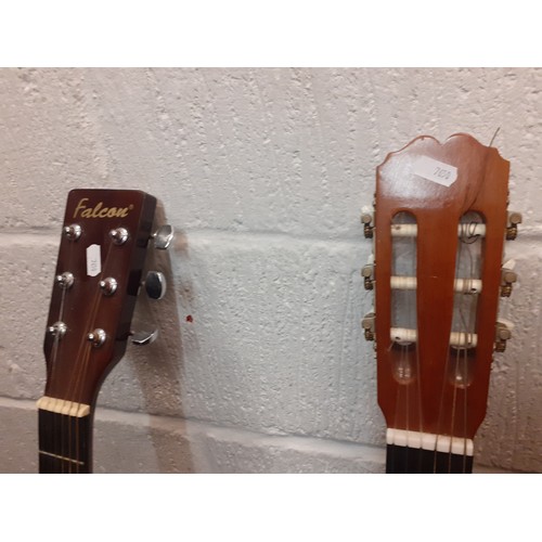 473 - Two 6-string acoustic guitars comprising a Falcon model no:FG100N and a Spanish BM Concert guitar. L... 