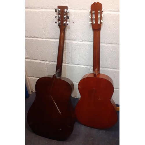 473 - Two 6-string acoustic guitars comprising a Falcon model no:FG100N and a Spanish BM Concert guitar. L... 