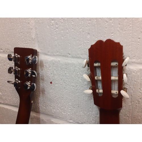 473 - Two 6-string acoustic guitars comprising a Falcon model no:FG100N and a Spanish BM Concert guitar. L... 