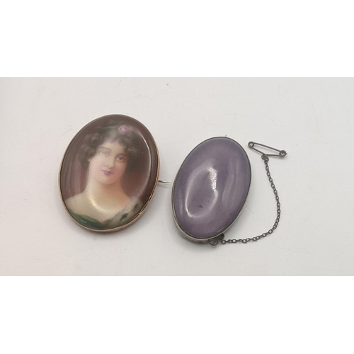 165 - A hand painted portrait miniature brooch in oval form depicting a young female, signed Leslie Johnso... 