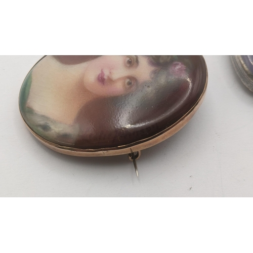 165 - A hand painted portrait miniature brooch in oval form depicting a young female, signed Leslie Johnso... 