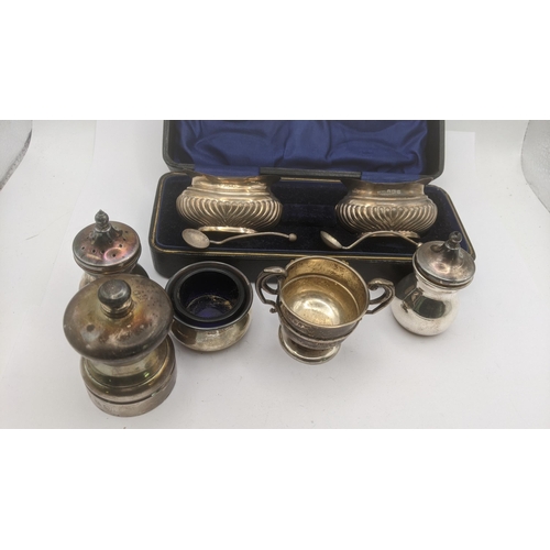 167 - Silver to include  pair of salts in a fitted case, a pepper grinder, a meat stick and others, total ... 