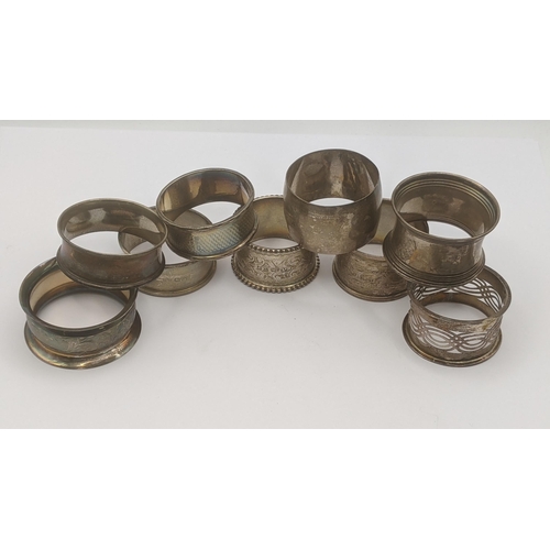 168 - A group of silver napkin rings, some having floral engraved decoration, total weight 136.7g Location... 