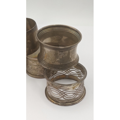 168 - A group of silver napkin rings, some having floral engraved decoration, total weight 136.7g Location... 