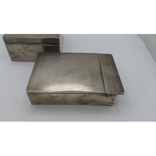 174 - Two silver cigarette boxes having engine turned design to include one example in rectangular form, h... 